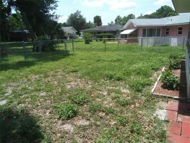 Building Photo - 9529 E Village Green Cir