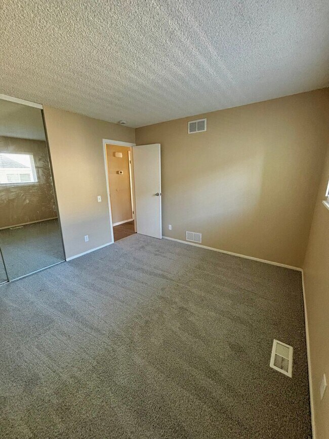 Building Photo - Live in Style! Updated Denver 2-Bedroom Townhome with Modern Design & Large 1-Car Garage!!