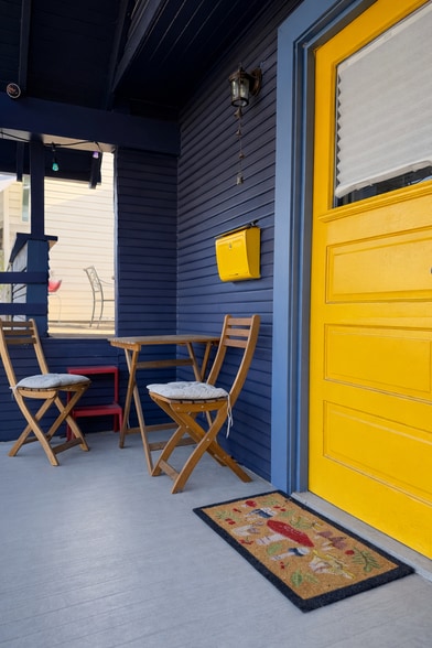 Covered front porch that leads to the rooftop deck! - 604 NE Shaver St