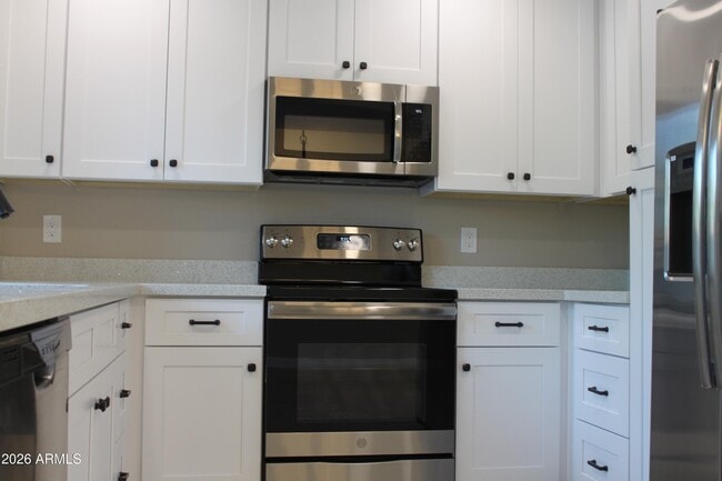 Building Photo - 1550 N Stapley Dr