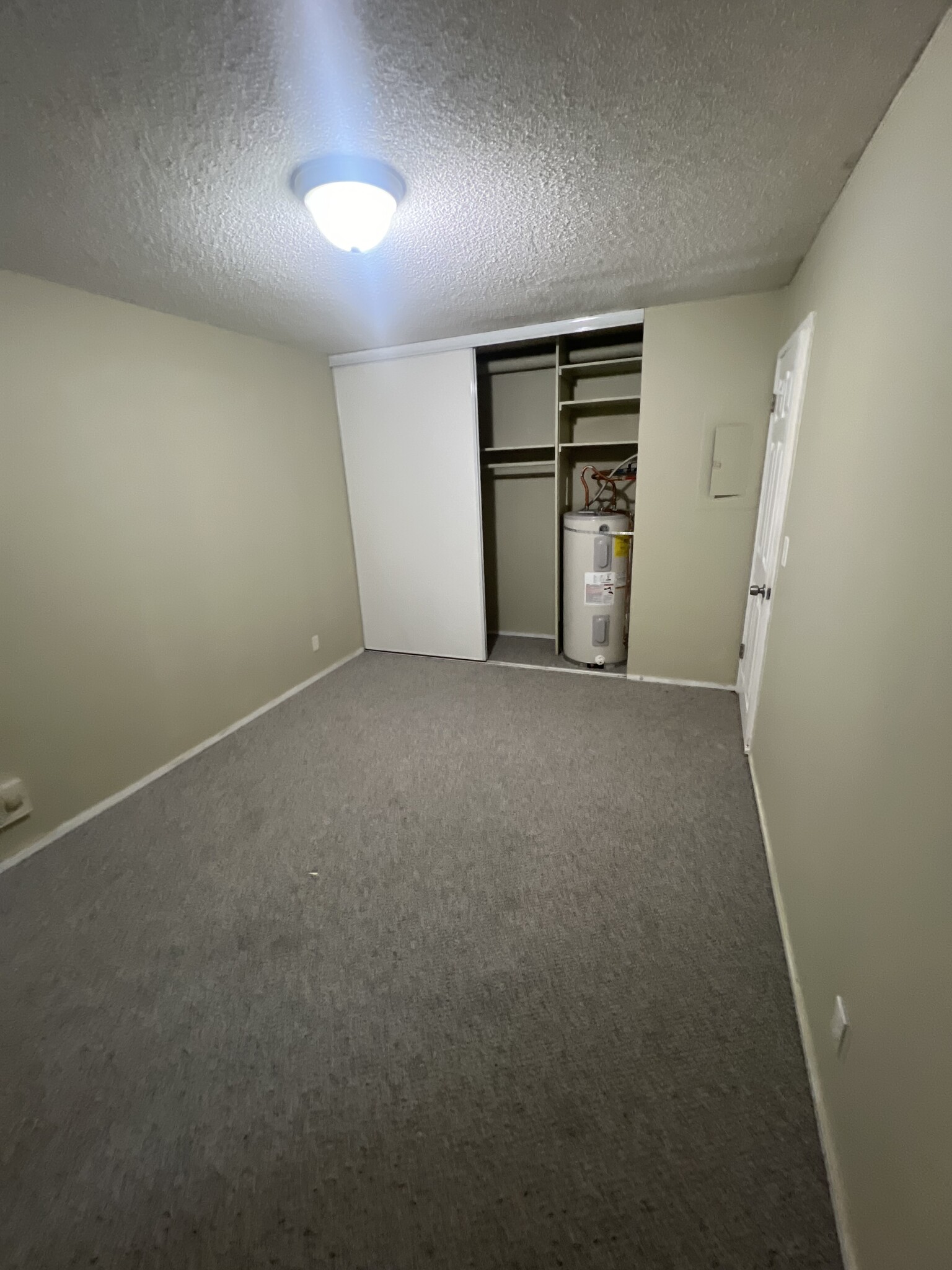 Bedroom. Closet does hold waterheater - 100 Kerr Pkwy