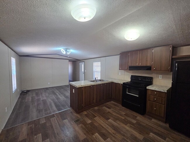 Building Photo - Cute, Clean & Affordable 3 Bed / 2 Bath Home in Central Bullhead City!