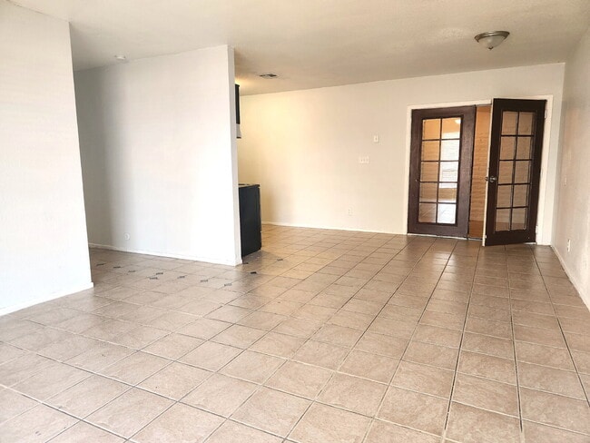 Building Photo - FIRST FLOOR LIVING WITH OPEN KITCHEN, DEN & CARPORT – GCU ACCESS