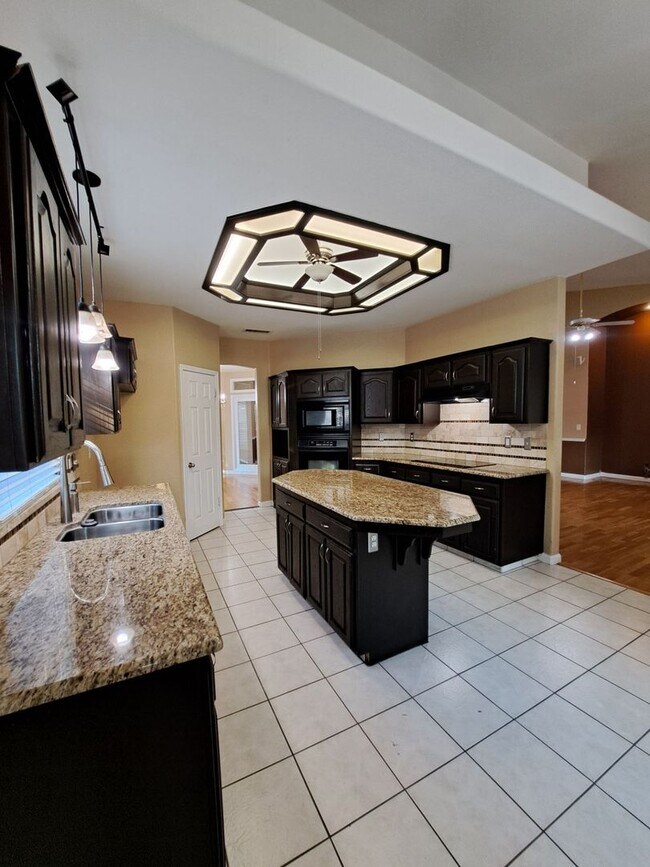 Building Photo - Move in Special: Half OFF your 1st Month's Rent! Elegant 4 Bedroom Home w/ Upstairs Loft Move in ...