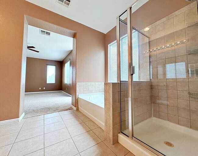 Building Photo - 4 BEDROOM HOME 3 CAR GARAGE ON A CORNER LO...