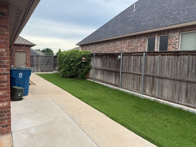 Building Photo - 3 bedroom + office  or 4th bedroom, storm shelter, neighborhood pond and walking track!