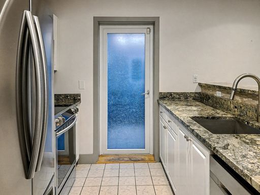 Building Photo - AVAILABLE NOW! Beautiful Queen Anne Condo with Puget Sound Views & Secure Parking!