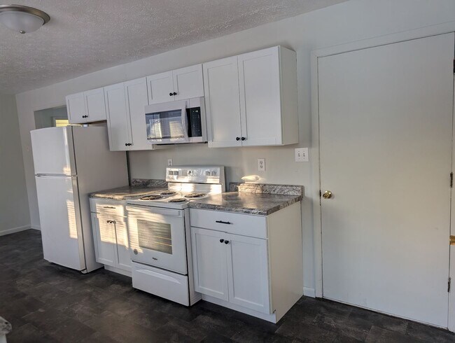 Building Photo - 57-63 John