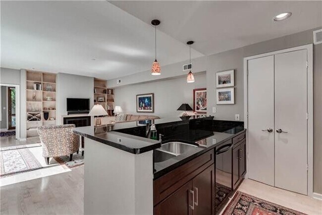 Building Photo - Luxury Living: De Saligny Condo - prestigi...