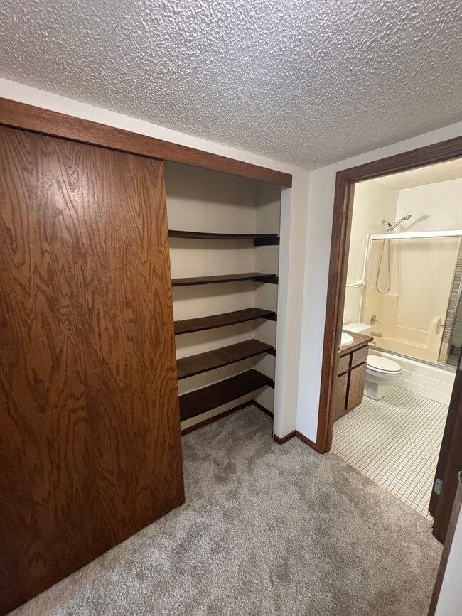 Building Photo - AVAILABLE NOW - Gorgeous 2 BR, 2 BA Condo, with Parking and Excellent Location