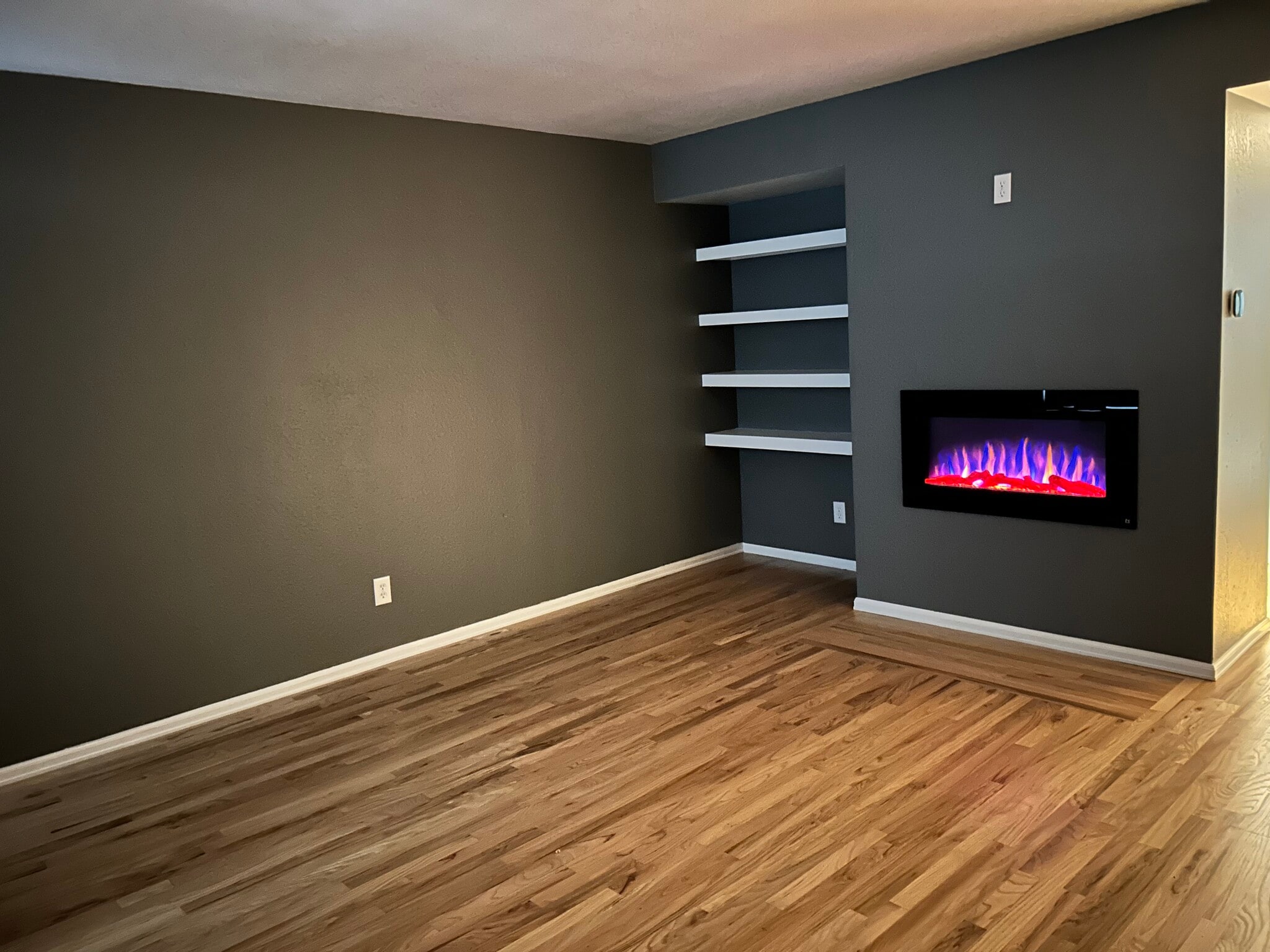 View of electric fireplace - 11584 Community Center Dr