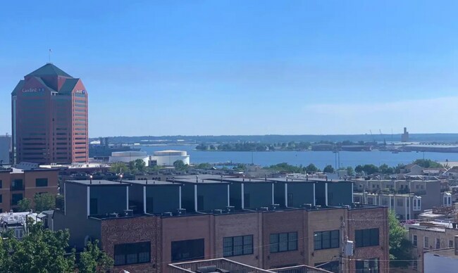 Building Photo - Beautiful EOG 3 bedroom  2.5 bath townhome with a 2 car garage and roof top deck overlooking the ...