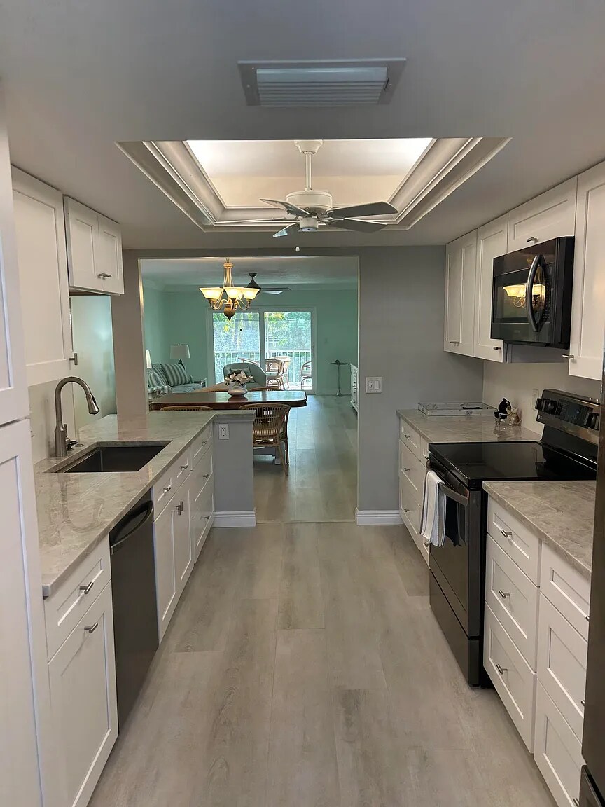 Kitchen to living area - 1260 Sugar Sands Blvd