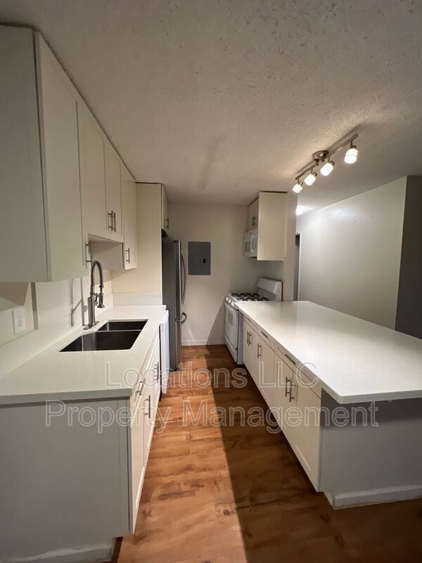 Building Photo - 91-1169 Mikohu St.