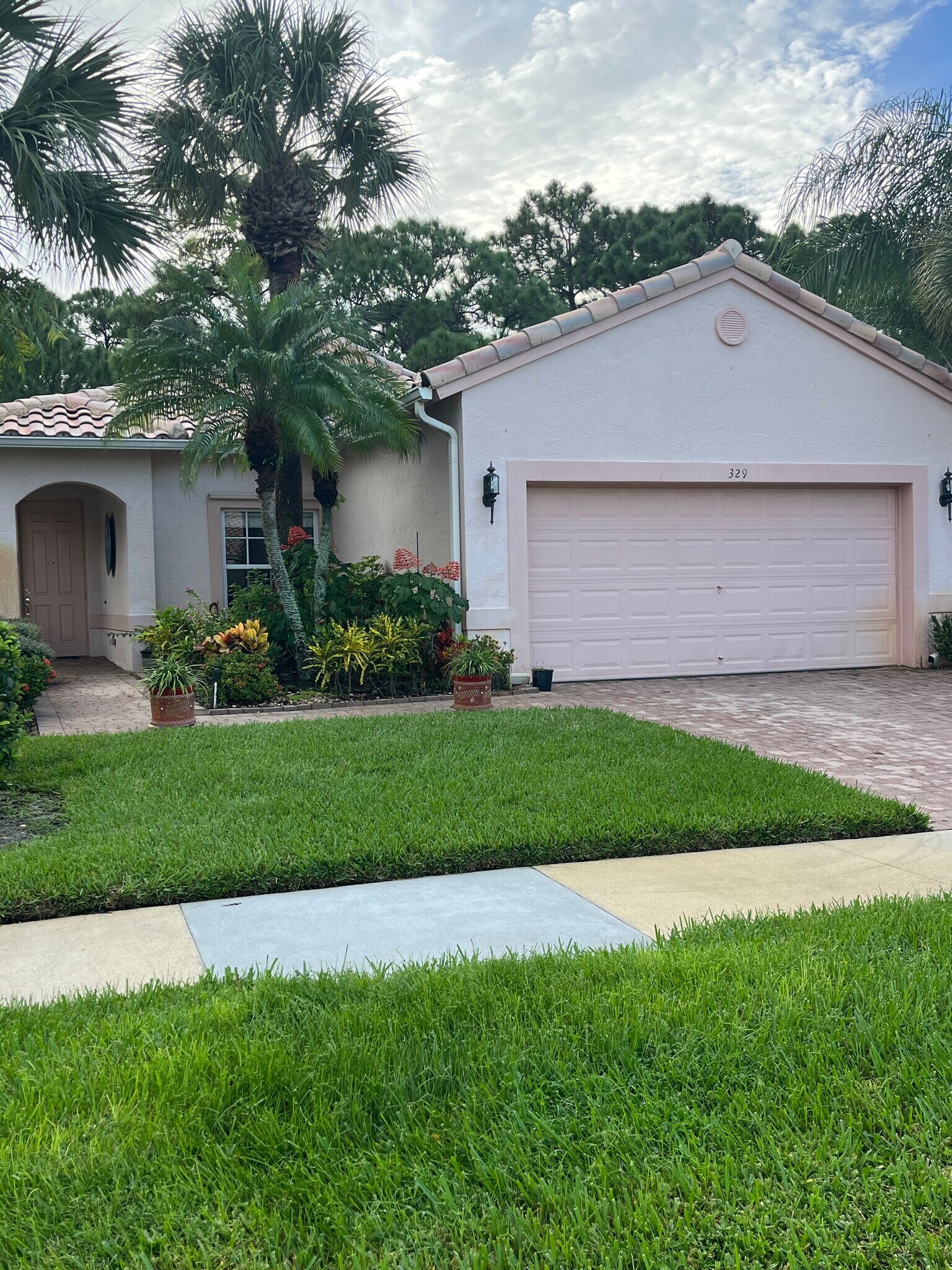 Front entrance, 2-car garage - 329 NW Treeline Trce