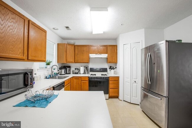 Building Photo - 9820 Berrywood Ct