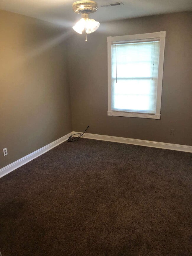 Building Photo - "Charming 4-Bedroom Home in Jonesboro with...
