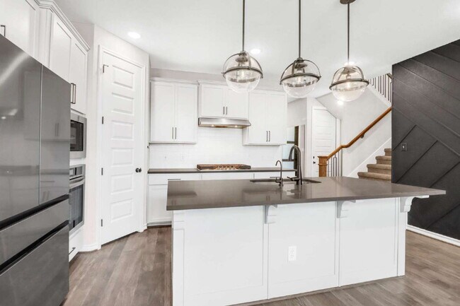 Building Photo - "Spacious 4-Bedroom Sanctuary with Cozy Fireplace in San Antonio's Prime Location!"