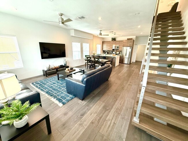 Building Photo - AVAILABLE NOW! Jaw Dropping 3 Story 3 Bedr...