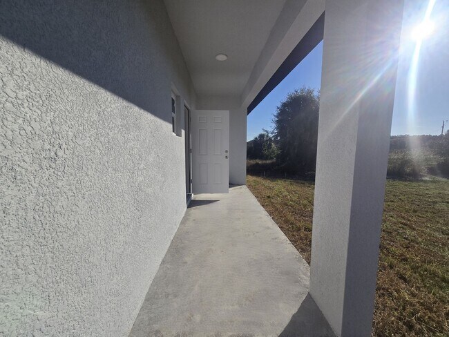 Building Photo - Brand New 2/2/1-PRIME SW LOCATION - Lehigh Acres