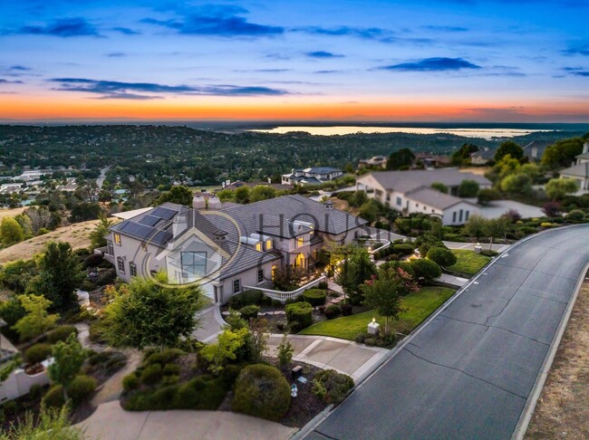 Building Photo - Palatial Executive Home in Custom Guard Ga...