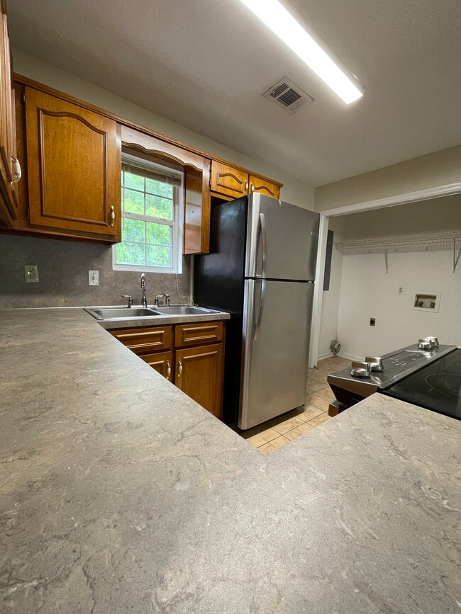 Kitchen and laundry - 2930 Lee Rd 430