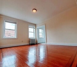 Building Photo - "Charming 1-Bed Oasis in the Heart of Woodside, NY!"