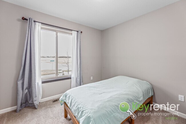 Building Photo - Spacious 4-Bedroom Home with Finished Basement & 3-Car Garage – Derby, KS