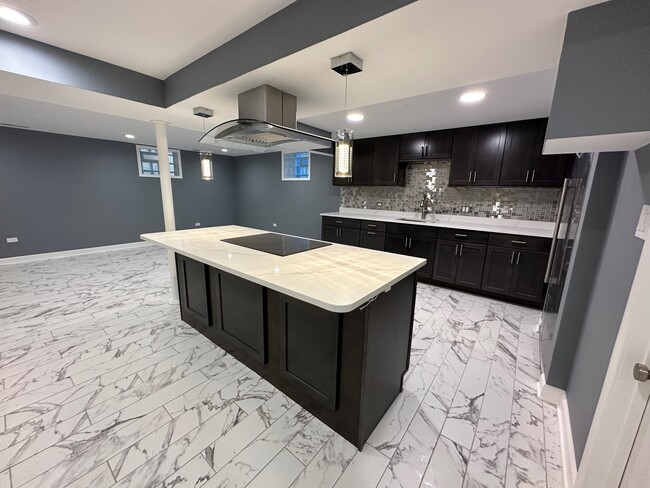 Building Photo - 8440 W Windsor Ave