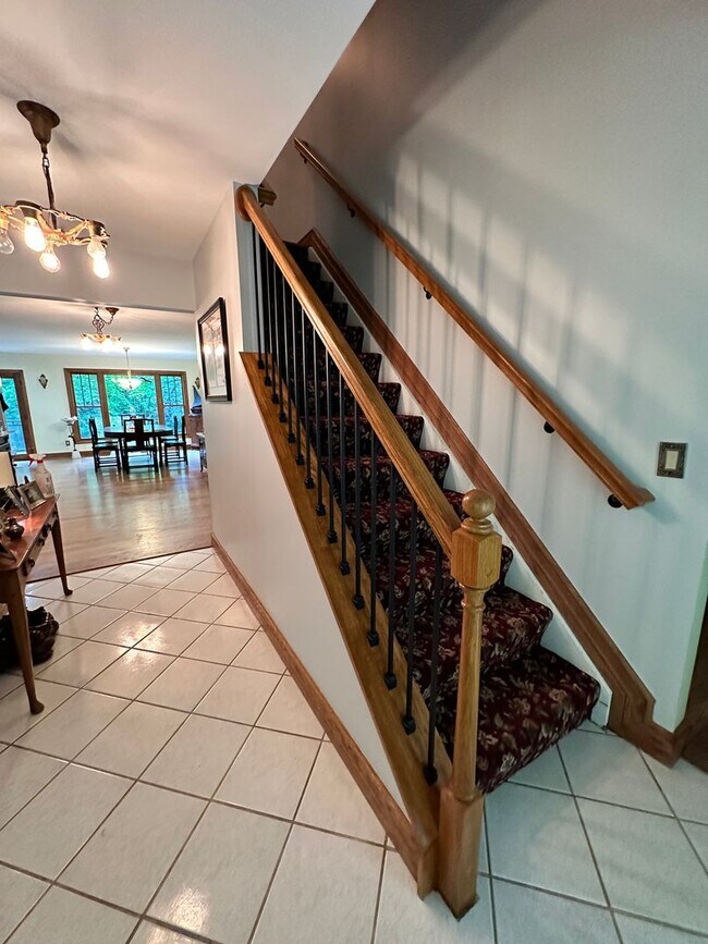 Building Photo - Dream Home in Highland, Michigan: Your Private Oasis on 5 Wooded Acres