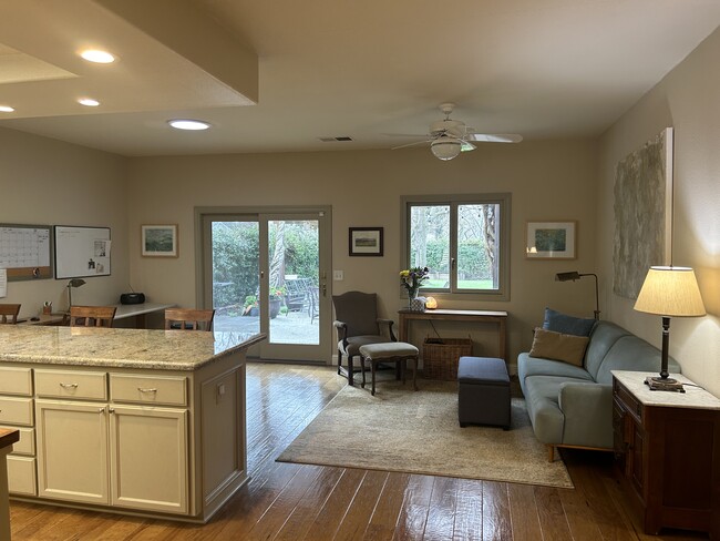 Partial view of open kitchen and sitting area, looking out to backyard patio - 1830 Glenn Pl