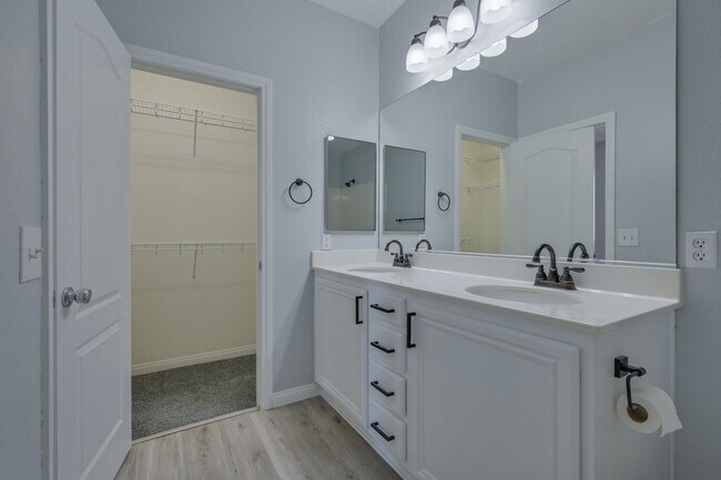 Building Photo - NW!! Gated!! Community Pool/Spa  Recreation Room!! New Paint!! New Flooring!!  Balcony!!  2 car g...