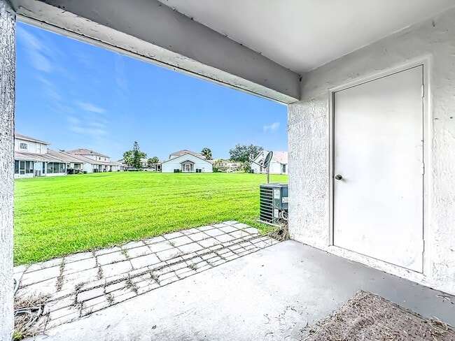 Building Photo - Island Cove Villas at Meadow Woods 1-Story...