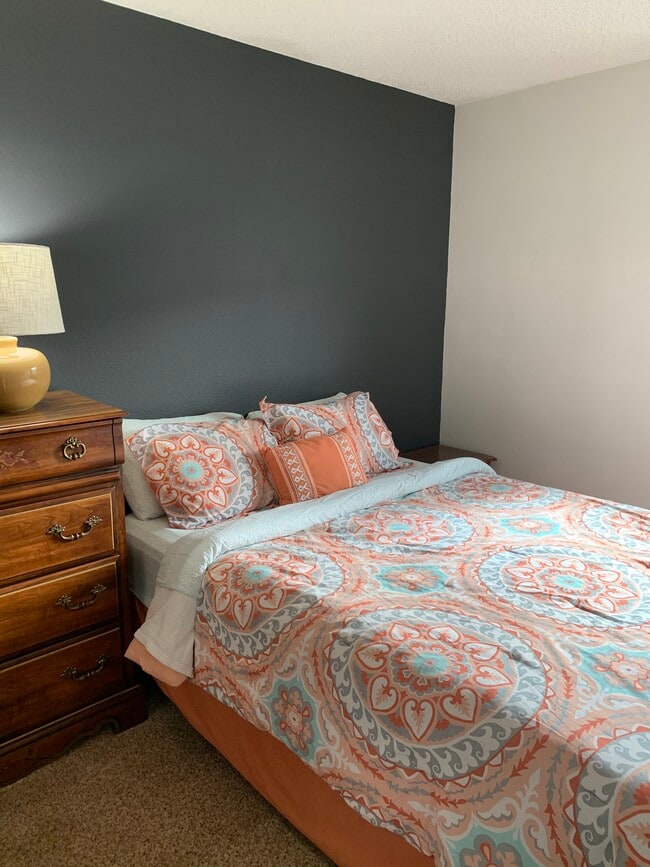 Secondary room upstairs with queen bed - 7230 Native Cir