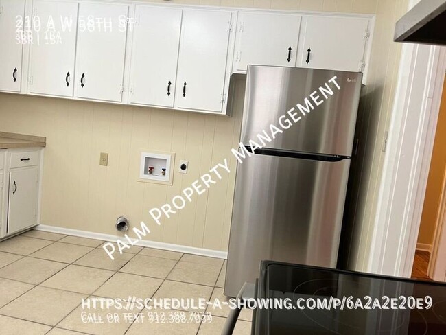 Building Photo - 210 W 58th St