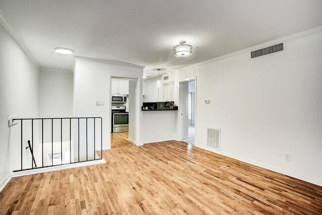 Building Photo - Beautifully remodeled two-story condo in a...
