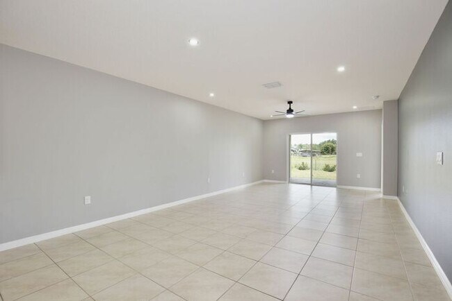 Building Photo - Move-In Ready 2BR/2BA Villa with Den + 2-Car Garage | Lake Nona Adjacent | Suncrest at St. Cloud