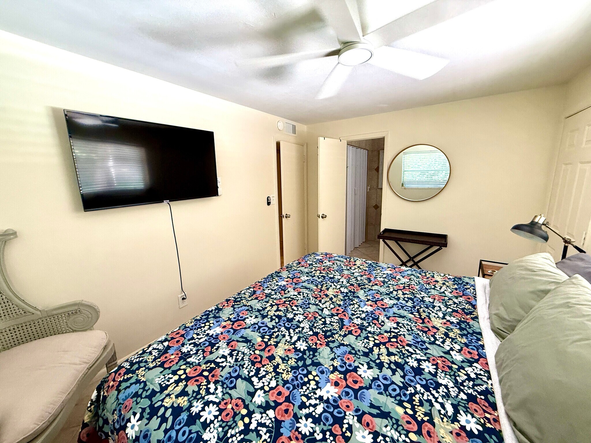 Primary Bedroom with King-Size Bed & 50-inch 4K UHD Roku Smart TV - 465 8th St N