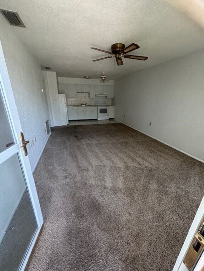 Building Photo - 55+, quaint 2/1 in a gated community locat...
