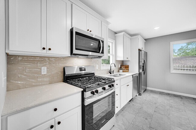 Building Photo - 3413 W 77th Ave