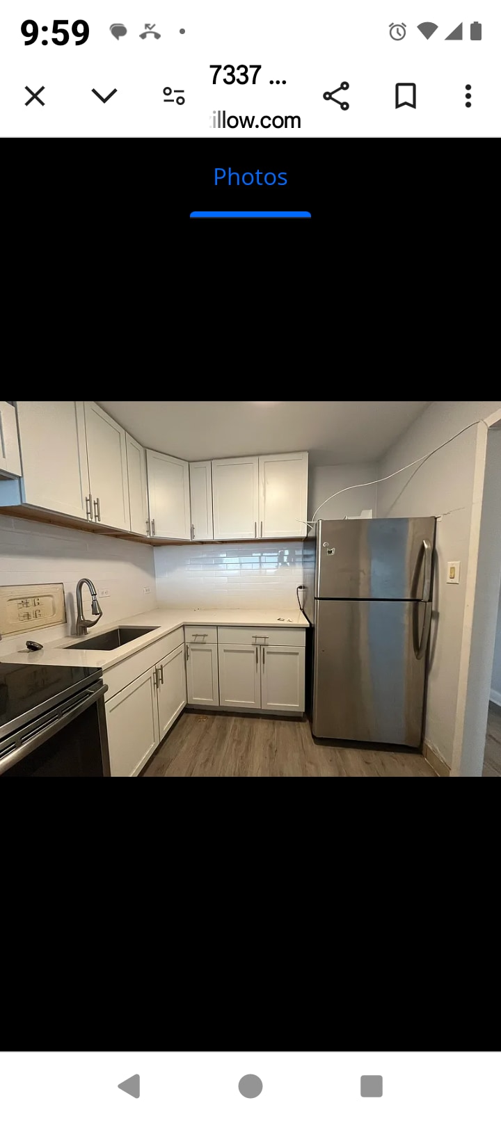 Kitchen with new appliances - 7337 S South Shore Dr