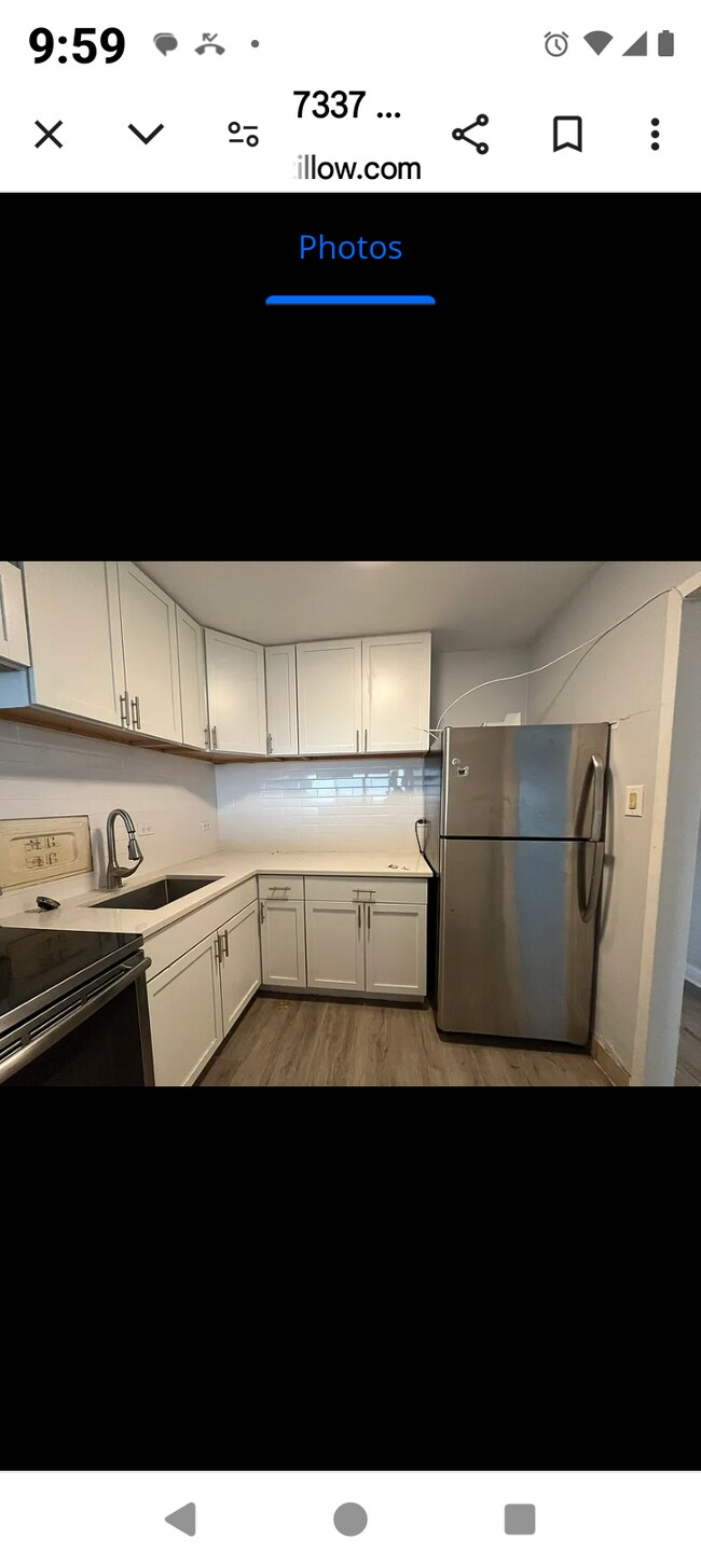 Kitchen with new appliances - 7337 S South Shore Dr