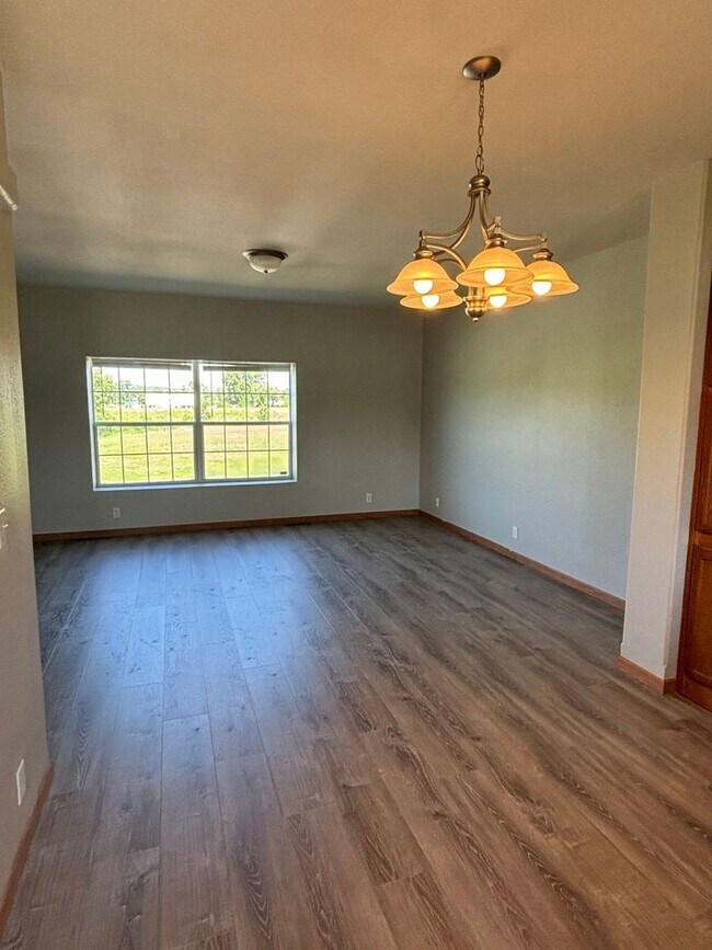 Building Photo - Fully Remodeled 3 Bedroom | 2.5 Bath Townhome – Great Location off K-18!