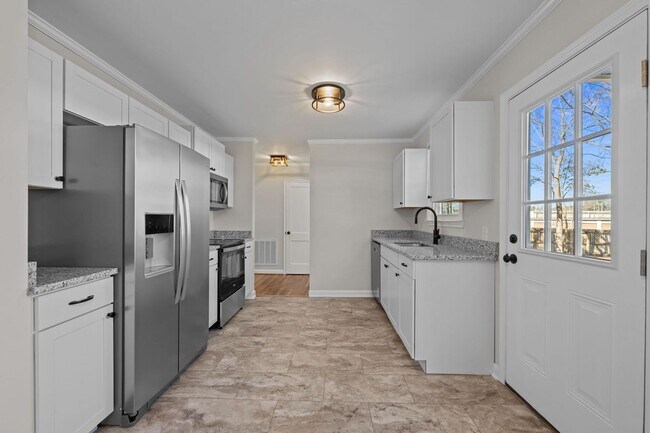 Building Photo - Three bedroom home for rent