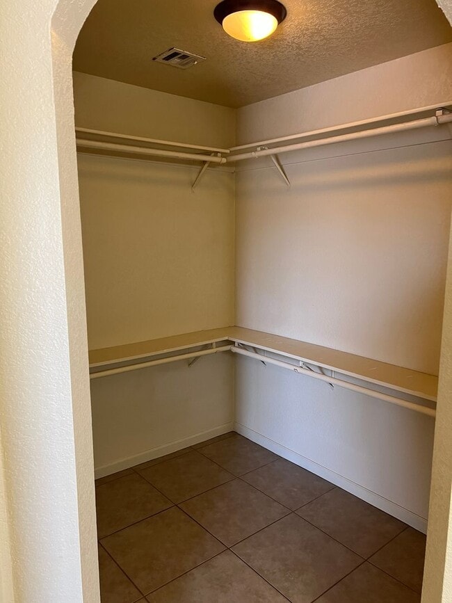 Building Photo - Four Bedroom Mountain View Home with large fenced back yard and double gates