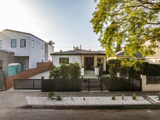 Building Photo - Brand-New Designer Home — 2 Bed + 2 Bath + Office | Gated Yard & Private Driveway Parking