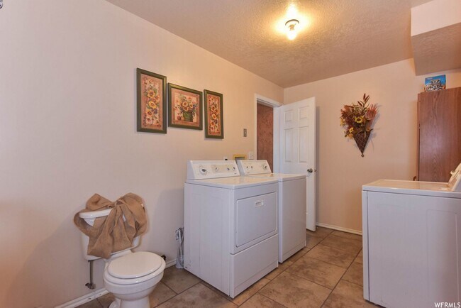 Building Photo - West Jordan's Hidden Gem: A Home Designed ...