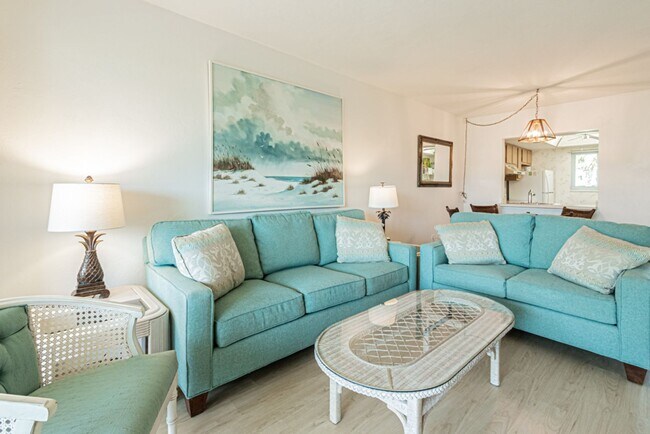 Building Photo - AVAILABLE NOW! Furnished Ground-Floor End Unit | Lake & Pool Views | Minutes to Marco Island & Do...