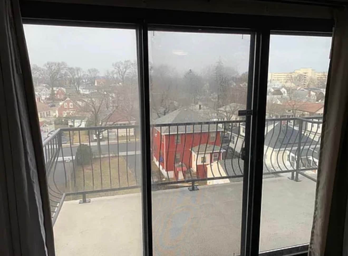 Balcony (overlooking 2 deeded parking spots, sometimes can see fireworks during holidays) - 500 Washington St