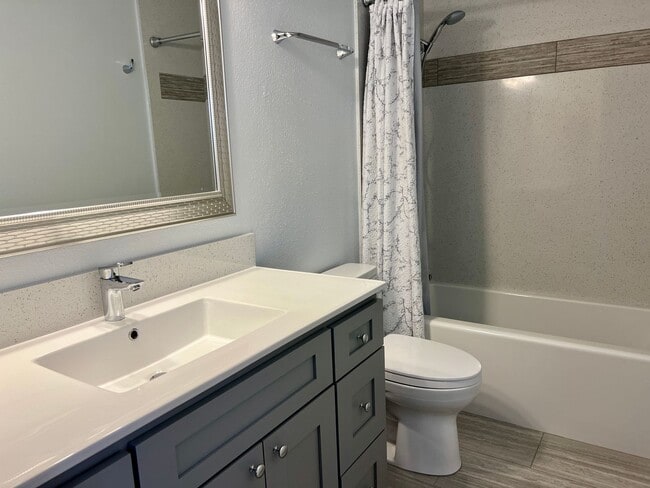 Building Photo - Great Natural light, Treetop Views with 2 Primary Suites plus OFFICE and a 2 car garage, It is li...